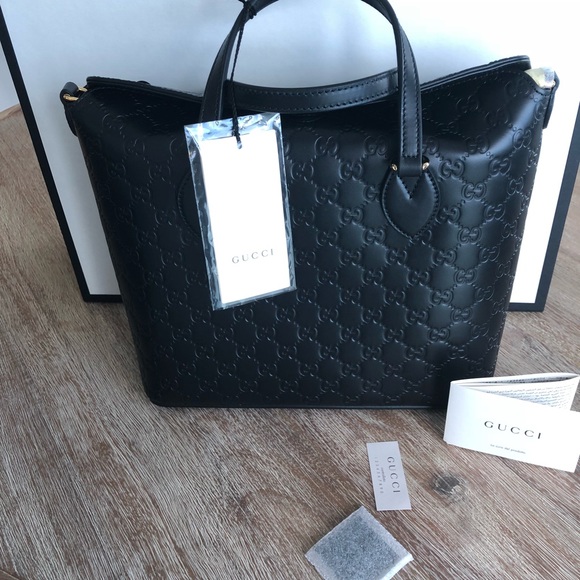 gucci signature leather top handle bag